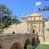The Baroque stone entrance of the Mdina Gate in Valletta, Malta